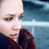 A beautiful woman is crying after her breakup, thinking of the song A Beautiful Goodbye, after having her heart broken.